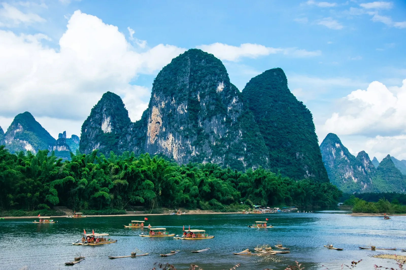 Limestone peaks and bamboo beside the Li River in the Guilin area