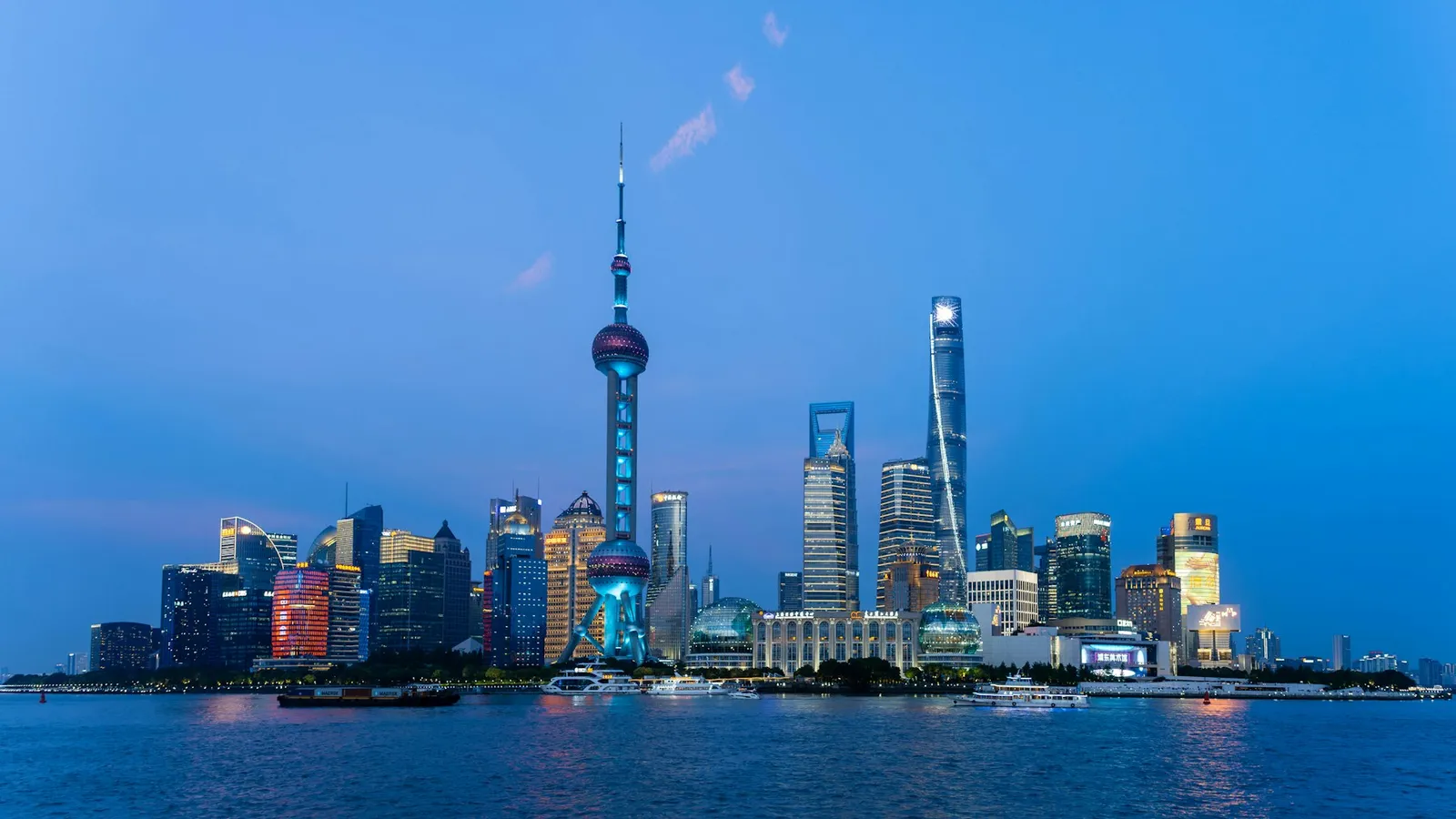 The Lujiazui skyline and Oriental Pearl Tower at dusk in Shanghai